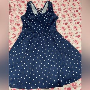 Short, light dress, navy blue. Beautiful crossed top-back part.